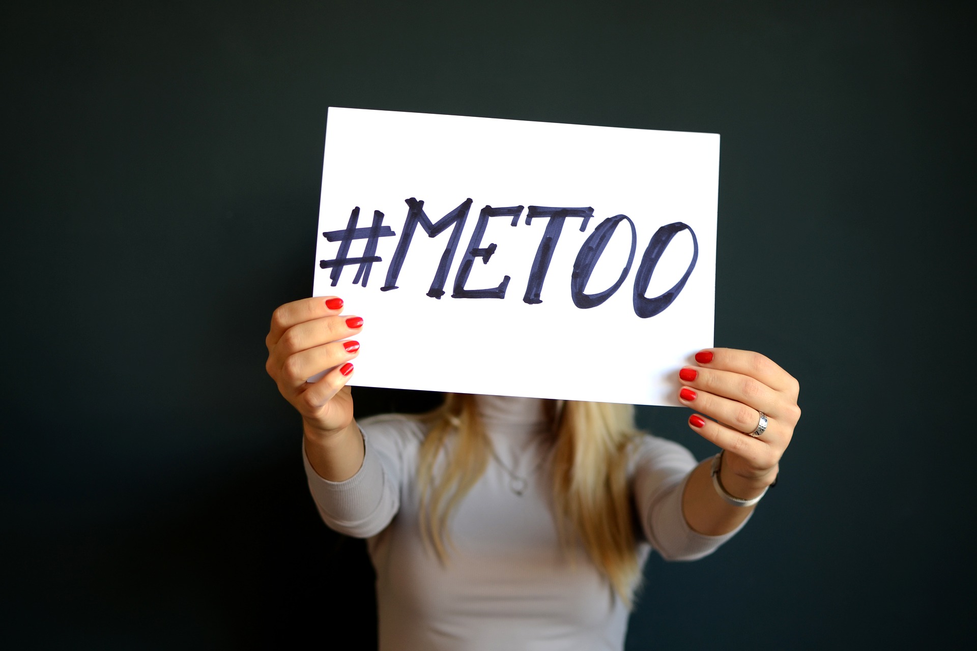 ny-state-sexual-harassment-laws-metoo-sign