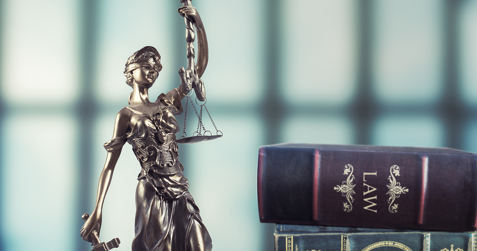 Statue of justice on Bokeh background